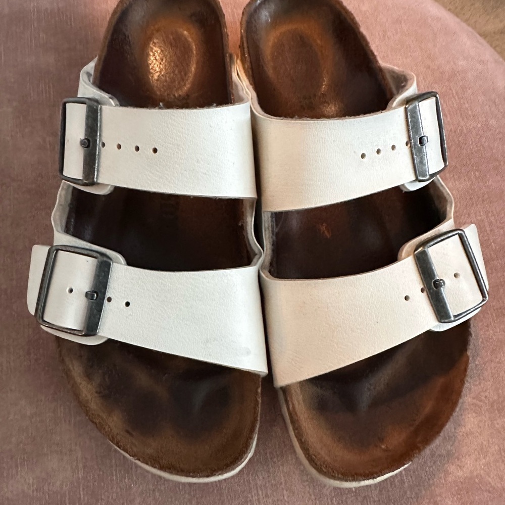 Birkenstock White Sandals with Silver Buckles. Gently used